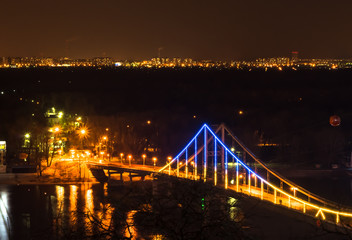 The bridge over the river at night