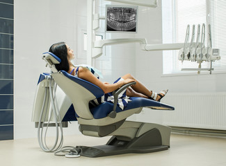 Girl on dentist chair