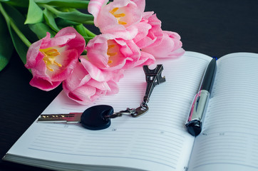 Tulips with pen and key