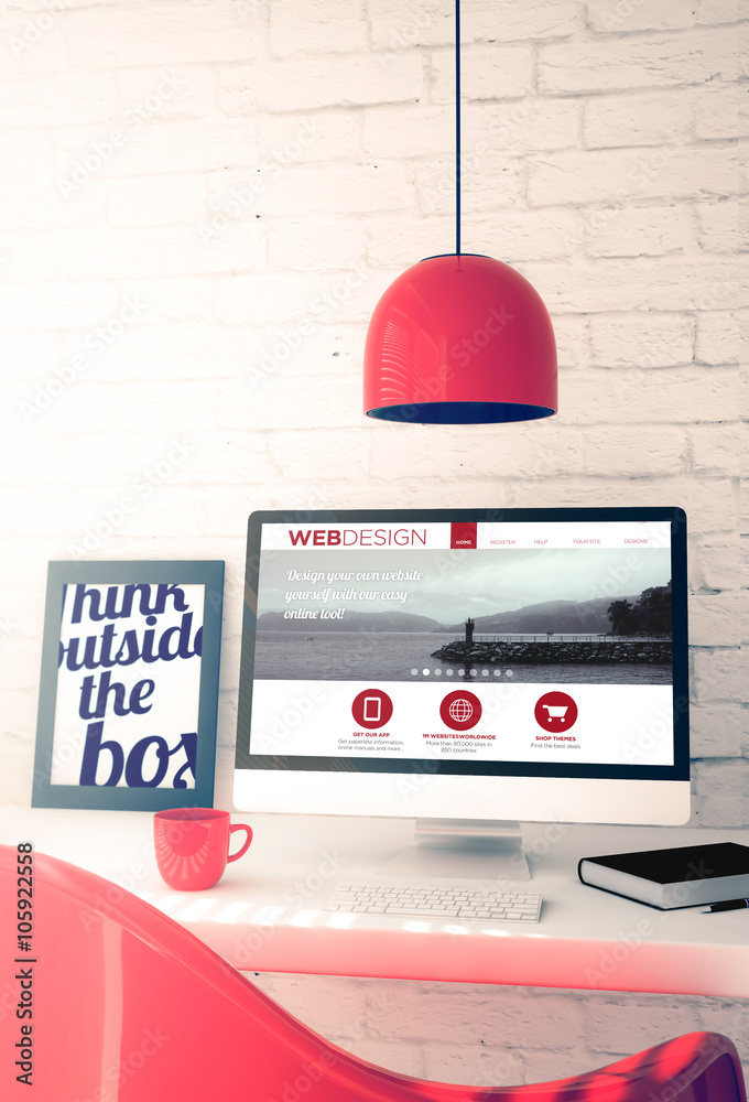 Wall mural red workspace with computer showing web design