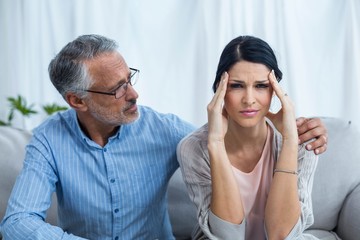 Therapist consoling a woman