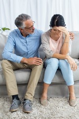 Therapist consoling a woman