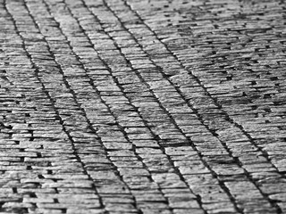 Cobblestone pavement in historial centre of city