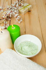 Beautiful spa composition with spring flowers on table close up
