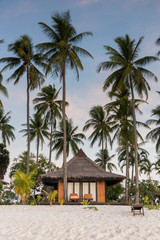 Fototapeta na wymiar Resorts in island beside the sea beach