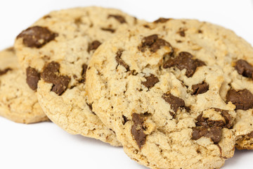 Chocolate chip cookie on white background.