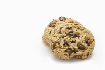 Chocolate chip cookie on white background.