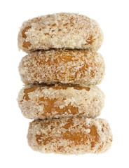 Fototapeta na wymiar Plain coconut flake donuts stack on a white background
