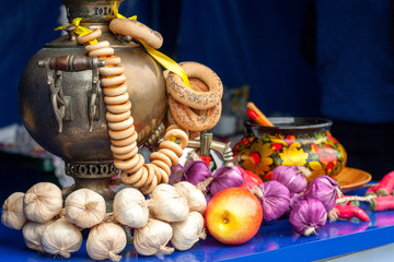 Gold samovar with bagels composition