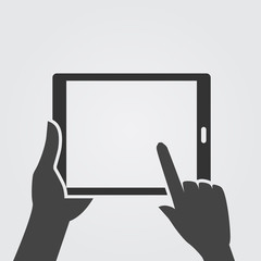 Hands holding and using digital tablet. Monochromatic.