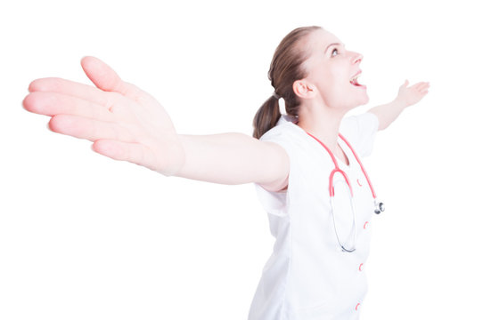 Happy Cheerful Female Doctor Standing With Mouth And Arms Open