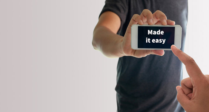 a man using hand holding the smartphone