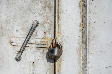 Metal door with lock in grungy and good texture