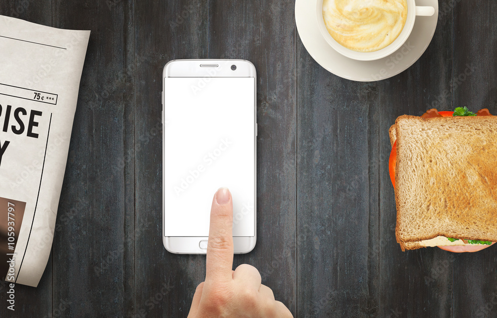 Poster smart phone with isolated display for mockup. hand touching display. newspaper, coffee and sandwich 