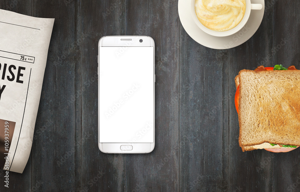 Poster smart phone with isolated display for mockup on table. newspapers, coffee and sandwich on table. top