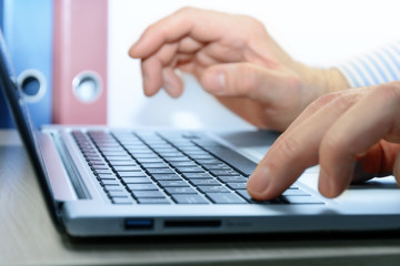 Close-up of typing hands