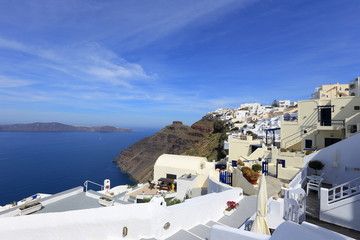 Fototapeta na wymiar White architecture on Santorini island, Greece. Beautiful landscape with sea view