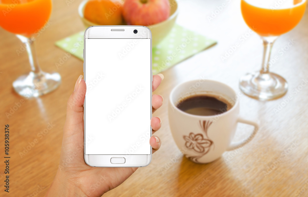 Aufkleber smart phone with isolated display for mockup in hand. relax time with coffee on table.