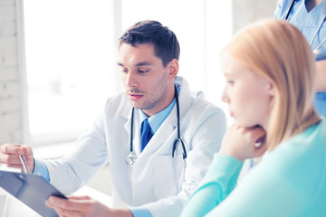 Fototapeta premium male doctor with patient