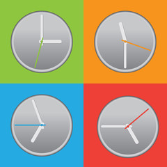 four colored clock with different time 