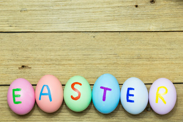 Easter eggs on wood background