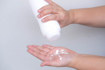 Poured talcum powder on the hand