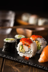 Maki and nigiri sushi, vertical. - 105942172