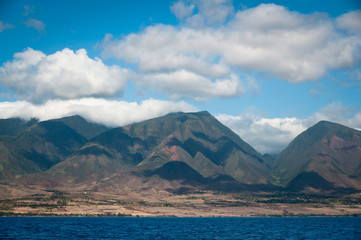 Fototapeta na wymiar Clouds over Maui mountains