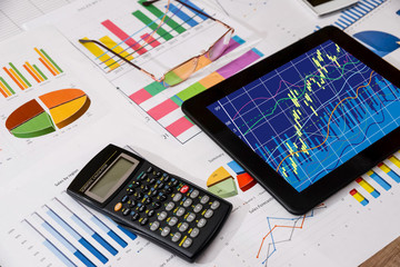 Obraz premium business workplace with digital tablet, mobile smartphone and so