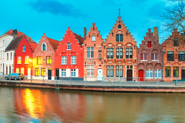 Fototapeta na wymiar Scenic city view of Bruges canal with beautiful medieval colored houses and reflections, Belgium