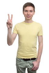 Naklejka premium student boy showing victory sign