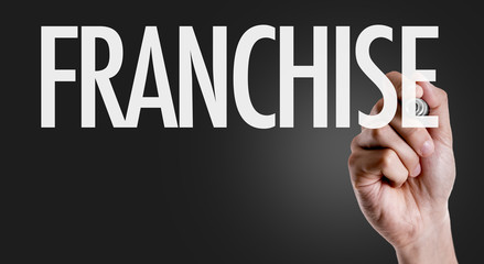 Hand writing the text: Franchise