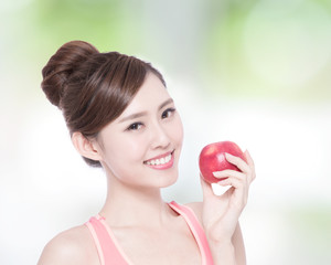 Happy health woman show apple