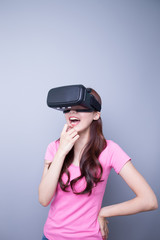 Happy woman watching virtual reality