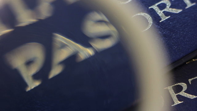 Checking Passport Cover Through the Glass