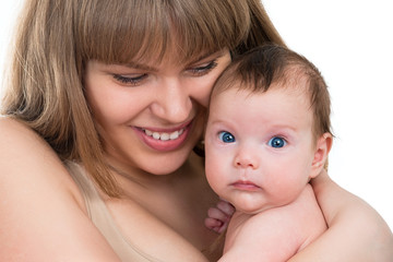 Portrait of beautiful smiling young mother with a baby