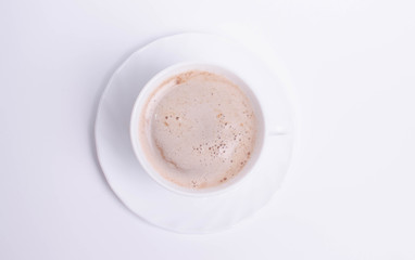 A cup of cappuccino coffee on white background