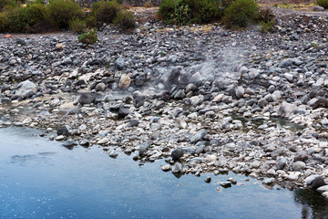 hot spring in the mountain river