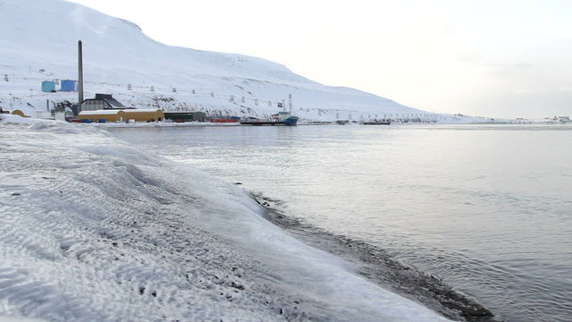 Ice coast of the Arctic Ocean. The surroundings of Longyearbyen, Svalbard. Norway. A cloudy day in March.
