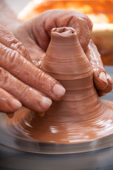 Hands of making clay pot