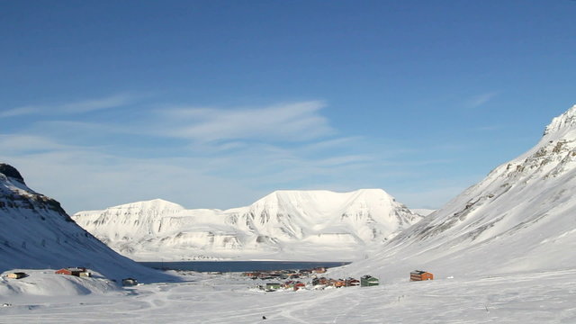 Longyearbyen, Svalbard. The World's Northernmost Inhabited Place. The small town is surrounded by mountains. A Sunny day in March.