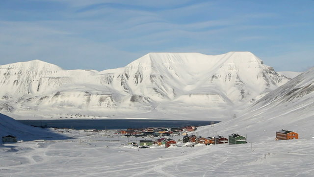 Longyearbyen, Svalbard. The World's Northernmost Inhabited Place. The small town is surrounded by mountains. A Sunny day in March.