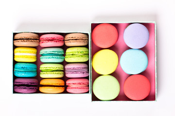 Collection of brightly colored French macarons are in a holiday