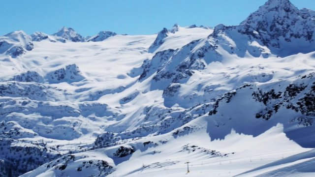 White snow-covered mountains in Italy. Rutor glacier.