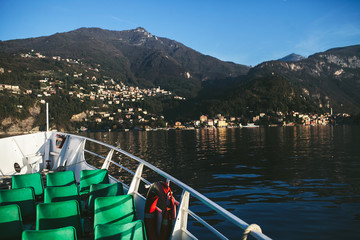 view from the passenger ship on the mountain side of the lake Como