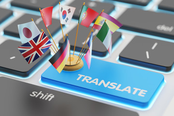 Foreign languages translation concept, online translator, macro view of computer keyboard with national flags of world countries on blue translate button