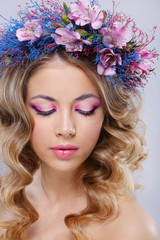 Naklejka premium Beautiful young woman in wreath