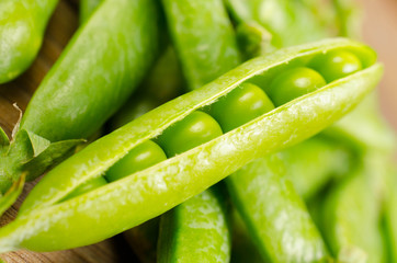 Fresh peas isolated on white background