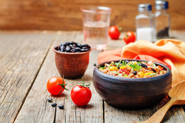 Black beans, corn and tomato red and white rice with chicken