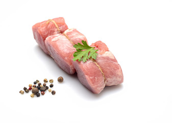 raw fillet medallions on a white background